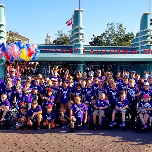 Camp Perthes group in purple shirts at Disney California Adventure