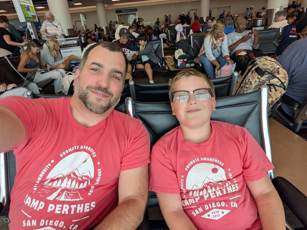 A dad and his son at a Perthes event